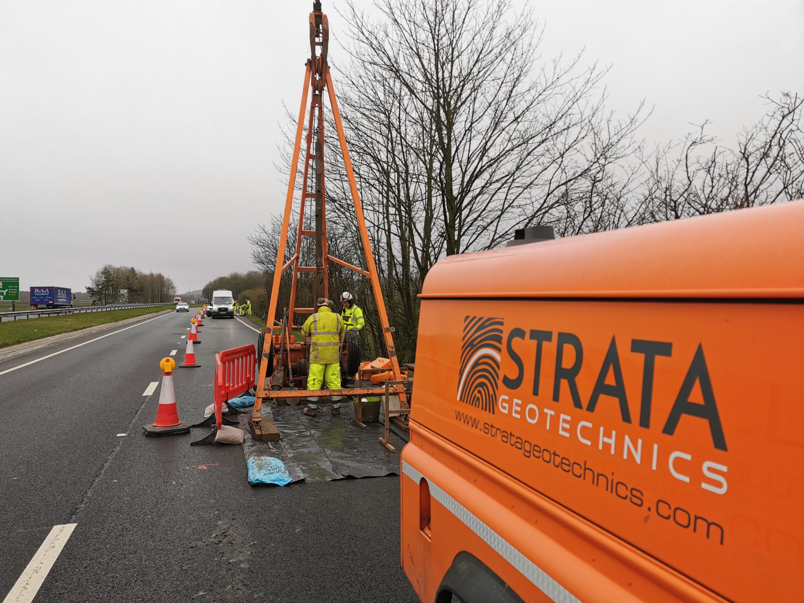 Strata Geotechnics van and rig during a Highways England project