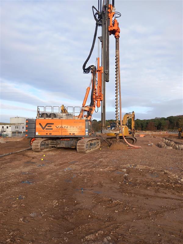 piling rig in operation at subsea cable factory site near Port of Nigg.